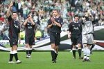 Celtic v Dunfermline Athletic 19th March 2006. Players applauding the fans (3)
