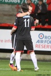 Pars v Arbroath 25th February 2014. Ross Forbes celebrates with Danny Grainger!