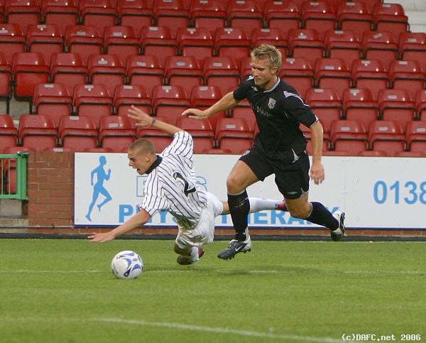 (c) www.DAFC.net
Photographs can be requested from photos@dafc.net
Calum Woods gets felled in the penalty area
(WestBrom_25Jul2006_Woods_Penalty_area.jpg)