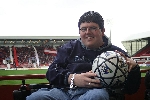 Nathan Davies aka Tartan Red with his signed DAFC football.