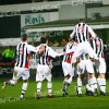 Pars v Livingston 30th December 2008. Delighted Pars players mob Greg Shields (under there somewhere).