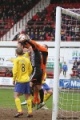 Pars v Stenhousemuir 8th March 2014. All hands up with Andy Geggan and Chris Smith.